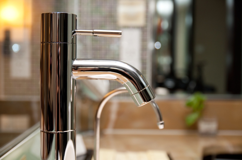 Leaking tap being repaired in Holland Park